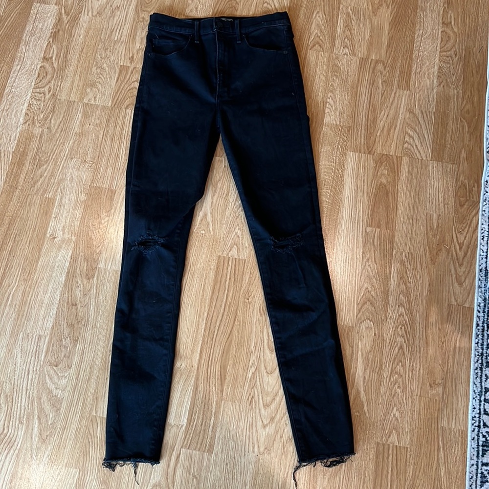 Black high rise super skinny jeans.